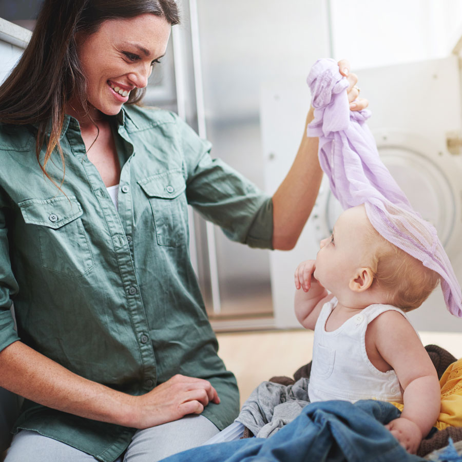 Si je choisis un départ différé sur ma machine à laver GrandÓ Simply-Fi, la lessive liquide entrera-t-elle en contact avec les vêtements avant le début du cycle de lavage ?